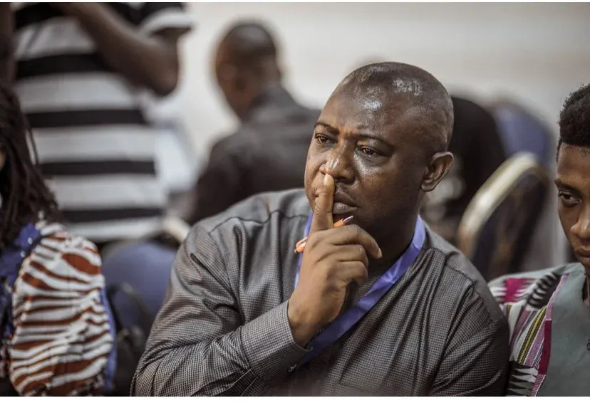 A delegate listening closely at the African Neurophysiological Society conference